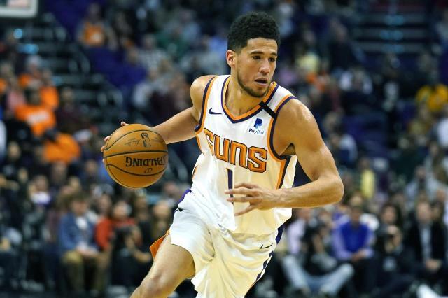 九游体育-从“数据刷子”到西决球队箭头 布克完成生涯蜕变